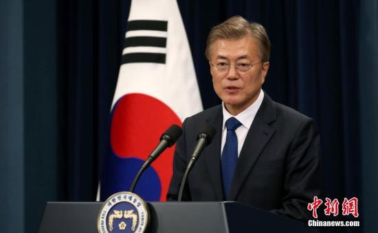 韩媒:韩美首脑会晤 商定力促朝美会谈如期举行