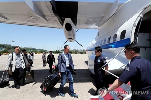 韩记者团沿东海航线直飞朝鲜 到达后将前往新闻中心