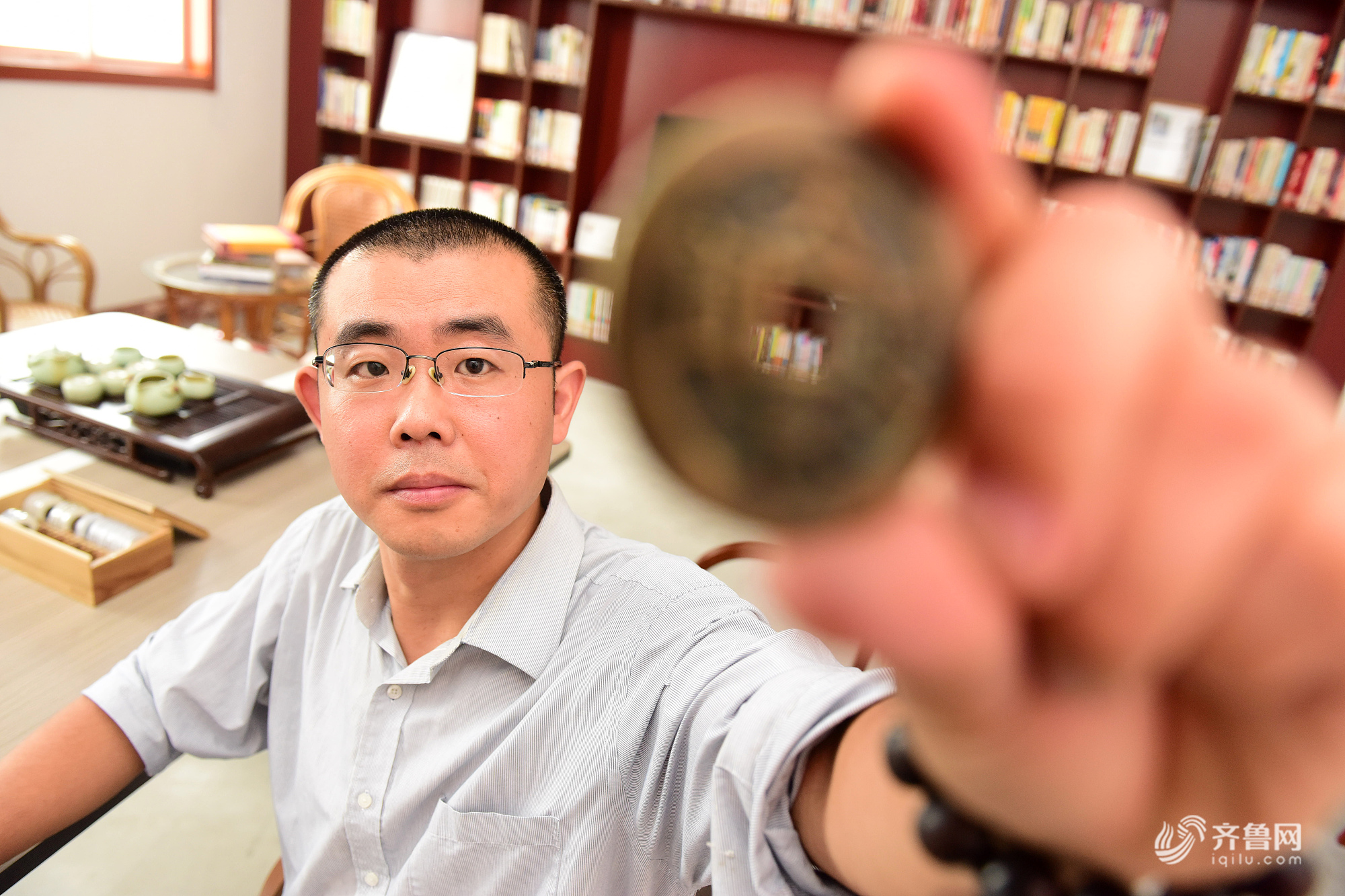山东男子历时14年收藏万枚古钱币 如今自建古钱博物馆 