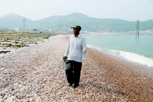 长岛球石是啥东东?海滩卵石,有人专门收藏和研究