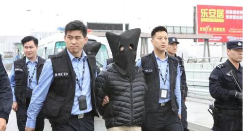 广东警方向香港警方移交2名香港籍犯罪嫌疑人