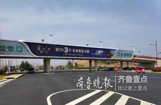 长江路高铁段改造升级铺油，出入高铁更顺畅啦！