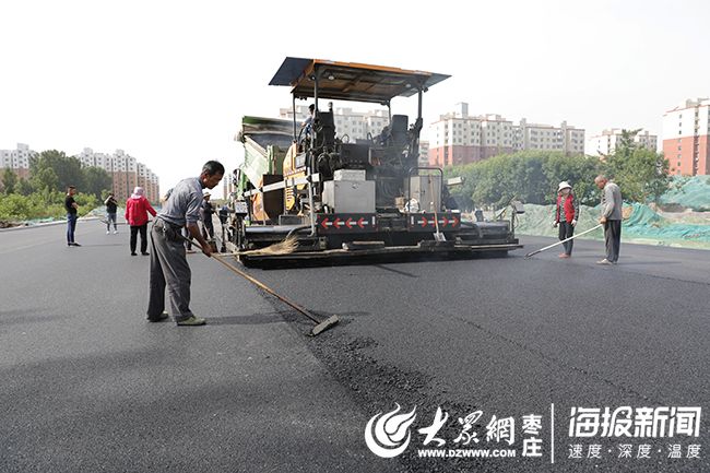 荆泉路进入沥青铺设阶段 预计6月上旬通车