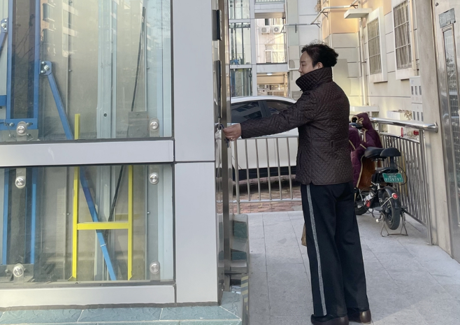 协商、“自治”破难题！潍坊中心城区71部加装电梯提前完工