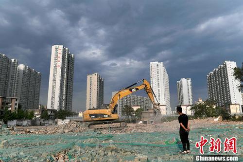 年中樓市觀察：不同城市房價分化 調控增“新四限”