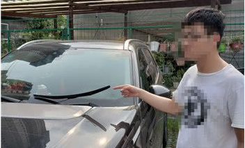 看不慣亂停車劃傷豪車 別把違法當成了正義